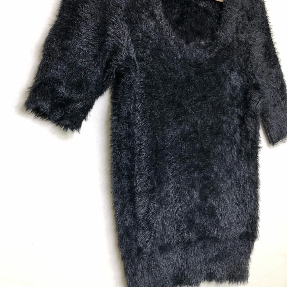 Knitted and knotted black, eyelash, scoop, neck sweater